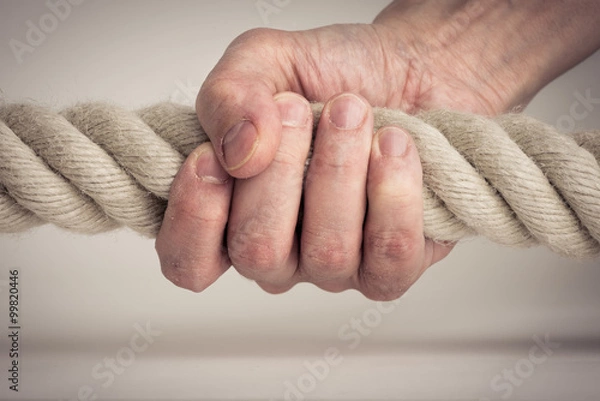 Obraz Hand holding strong rope