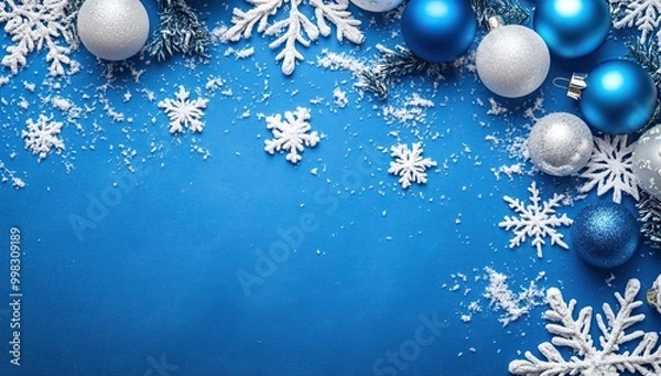 Fototapeta A winter-themed blue background with snowflakes and shiny blue Christmas ornaments. AI generated image