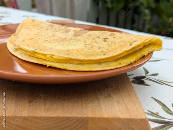 Obraz Pfannkuchen mit Käsefüllung auf einem Teller