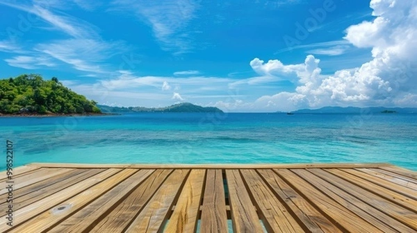 Fototapeta Wooden table on the background of the sea, island and the blue sky