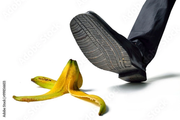 Fototapeta man about to step on banana peel