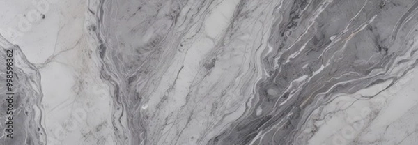 Fototapeta a close-up view marble surface with a swirling pattern of gray and white marble, creating a sense of movement and depth