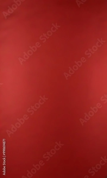 Fototapeta a red fabric surface with a smooth, uniform texture