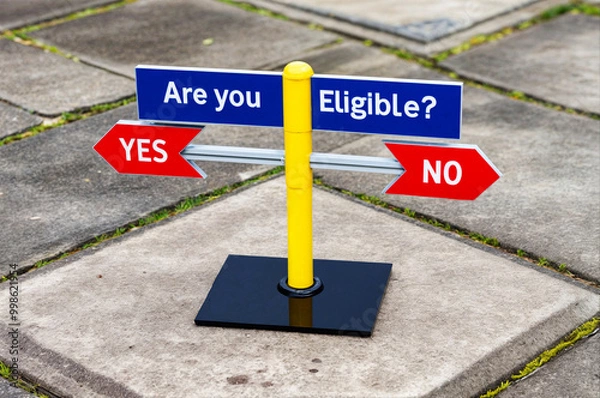 Fototapeta Metal pole with a sign on top has two arrows pointing in opposite directions, each labeled with the text word "YES" and "NO" against question "ARE YOU ELIGIBLE"