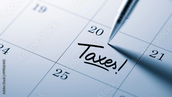 Fototapeta Closeup of a personal agenda setting an important date written w