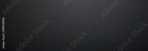 Fototapeta a dark, monochromatic photograph with a gradient effect, featuring a gradient from black to gray