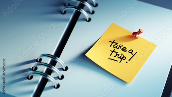 Obraz Closeup Yellow Sticky Note paste it in a notebook setting an app