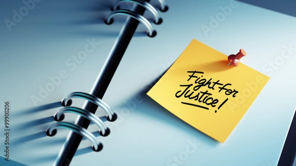 Fototapeta Closeup Yellow Sticky Note paste it in a notebook setting an app