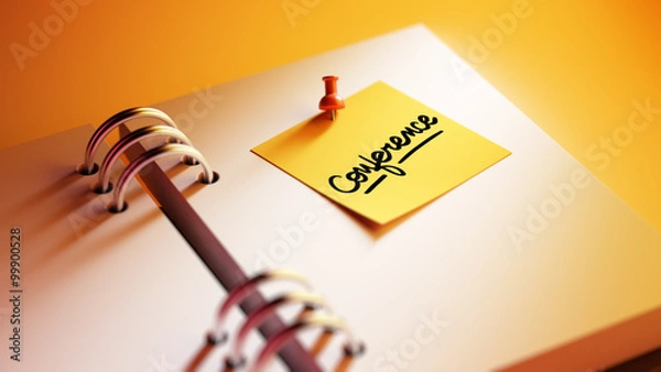 Obraz Closeup Yellow Sticky Note paste it in a notebook setting an app