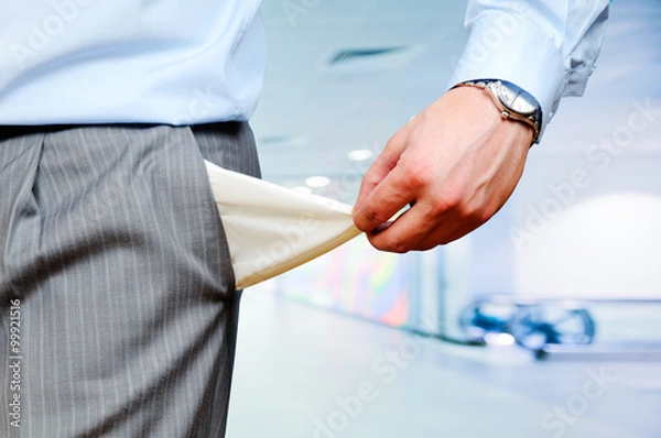 Obraz Man pulling out empty pockets