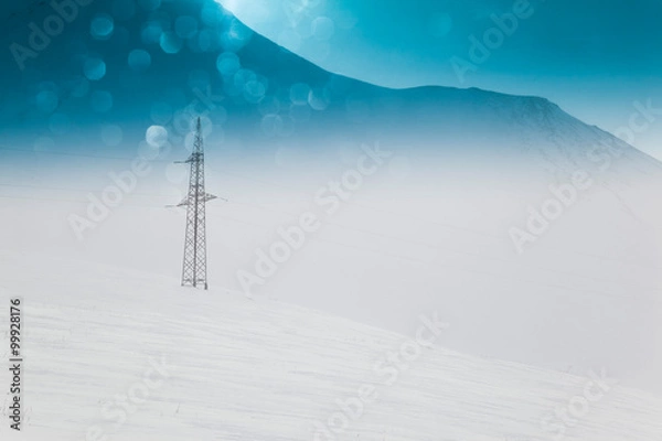 Obraz High voltage towers winter in mountains