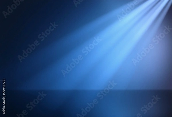 Fototapeta Abstract blue background with soft light beams.