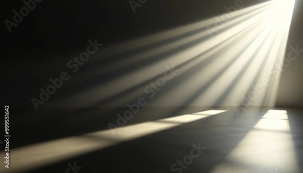 Fototapeta Sunlight beams through a window onto a floor and wall.