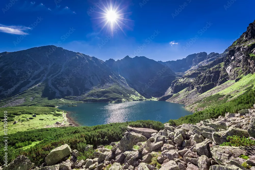 Fototapeta Breathtaking sunrise over Czarny Staw Gasienicowy in summer, Tatras