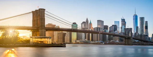 Fototapeta Panorama Mostu Brooklińskiego z Dolnym Manhattanem w tle, oświetlony zachodem słońca