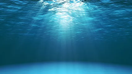 Fototapeta Ciemnoniebieska powierzchnia oceanu widziana z wody