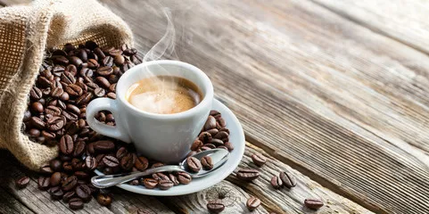 Fototapeta Filiżanka Kawy Espresso Z Fasoli Na Vintage Tabeli