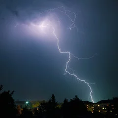 Obraz Spektakularna Burza z Błyskawicami nad Miastem