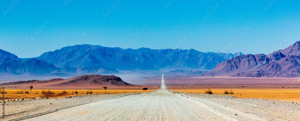 Fototapeta Droga szutrowa w Namibii - panorama - Afryka