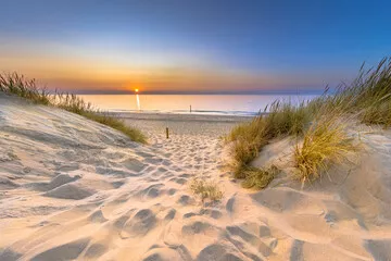 Obraz Malowniczy Zachód Słońca nad Piaszczystą Plażą