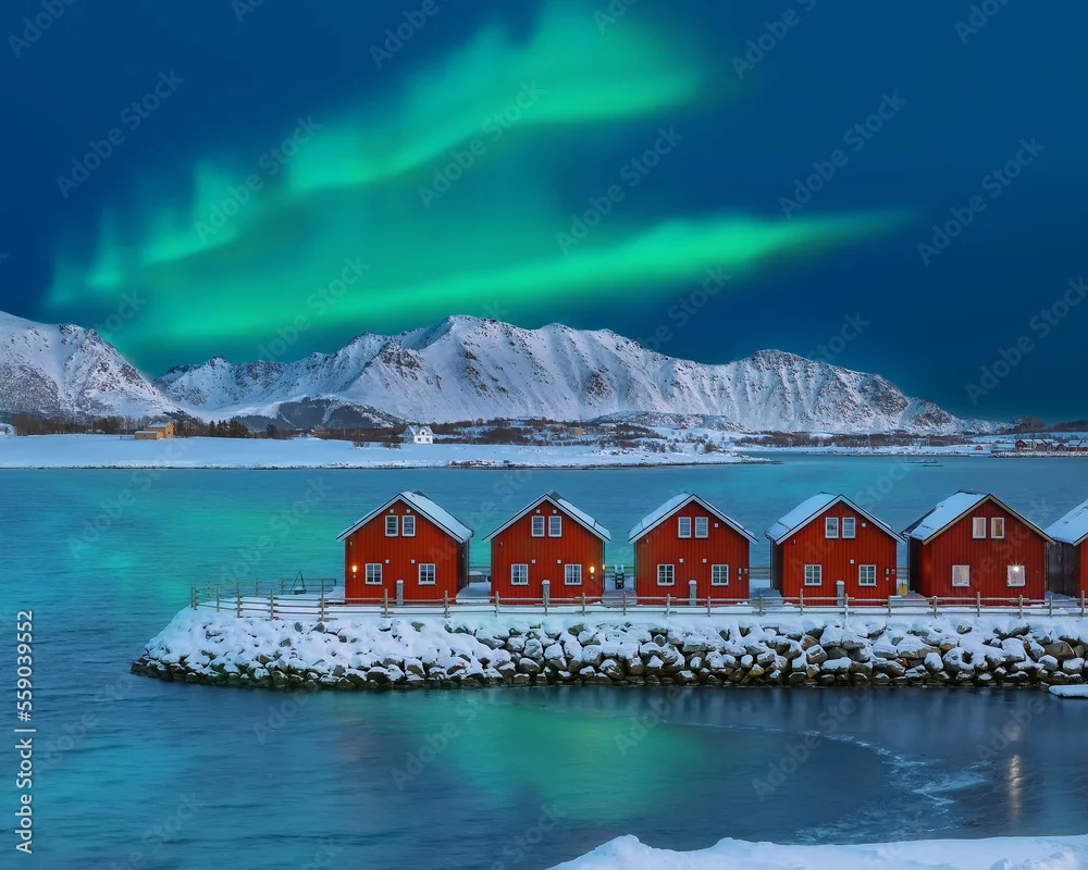 Obraz Spektakularna zorza polarna nad norweskimi domkami