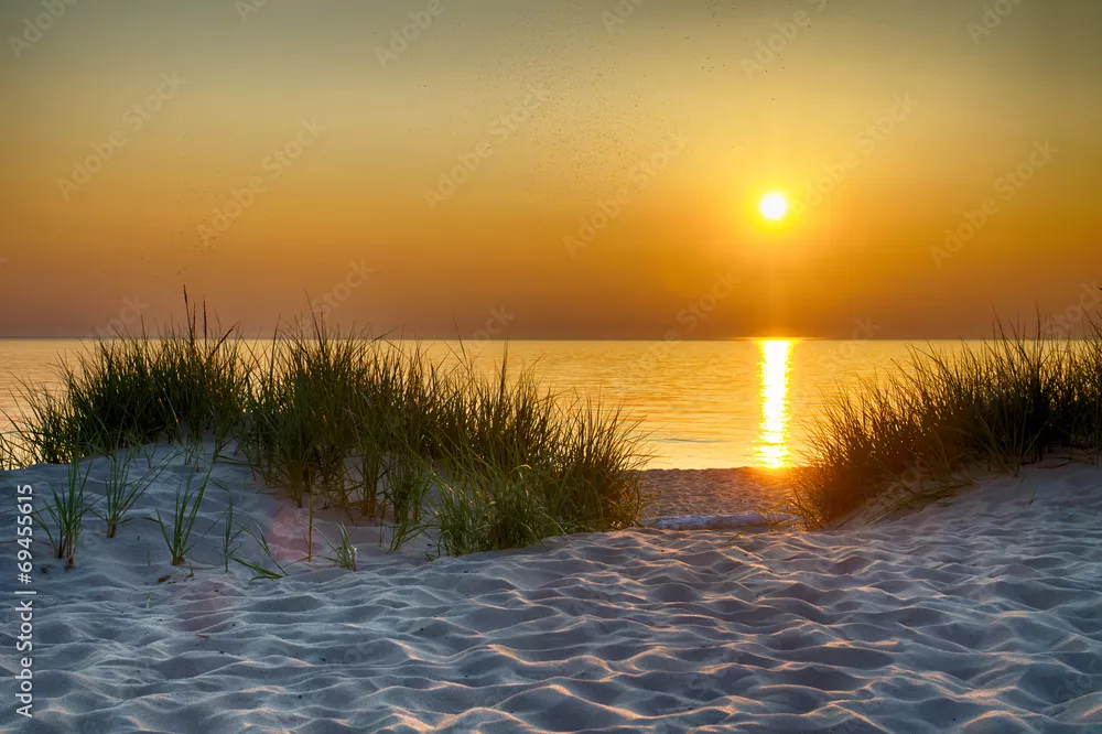 Fototapeta Zachód Słońca na Piaszczystej Plaży