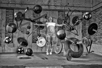 Fototapeta Kobieta Lewitująca Między Sprzętem Sportowym - obrazek 2